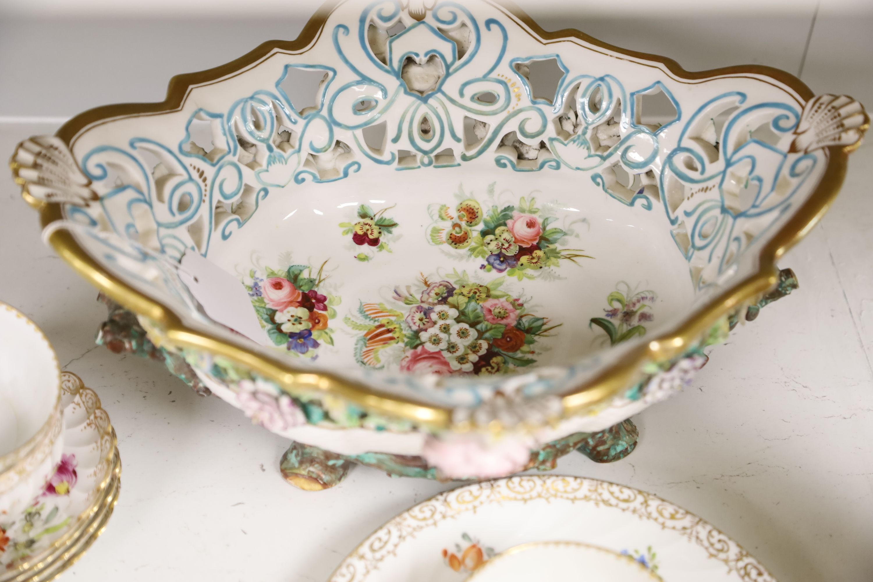 A Dresden-style pierced oval flower-encrusted bowl with branch feet and handles and a Dresden part tea service (15-pce)